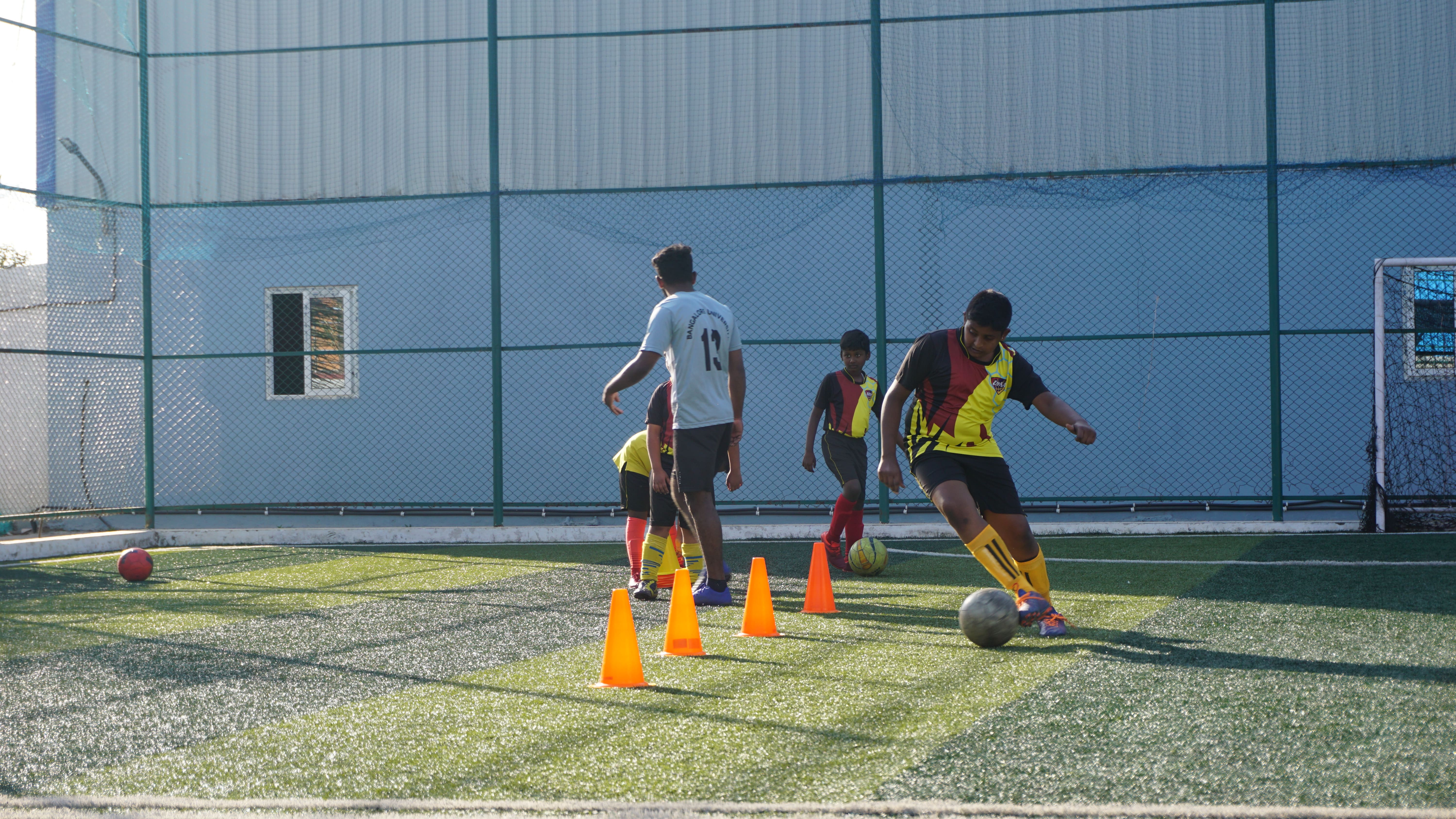 Happy Kids Playing Football